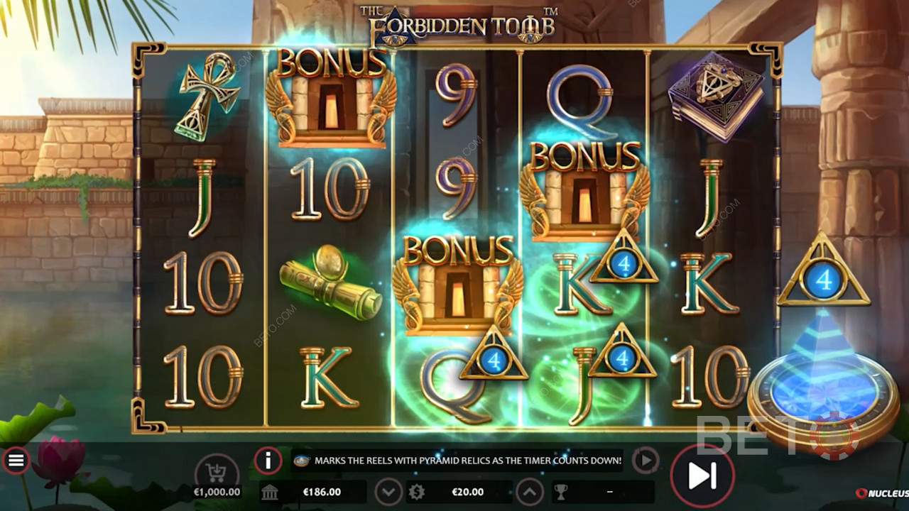 Käivitage tasuta keerutused 5 kuni 10 Wildiga videomängus The Forbidden Tomb. Nucleus Gaming